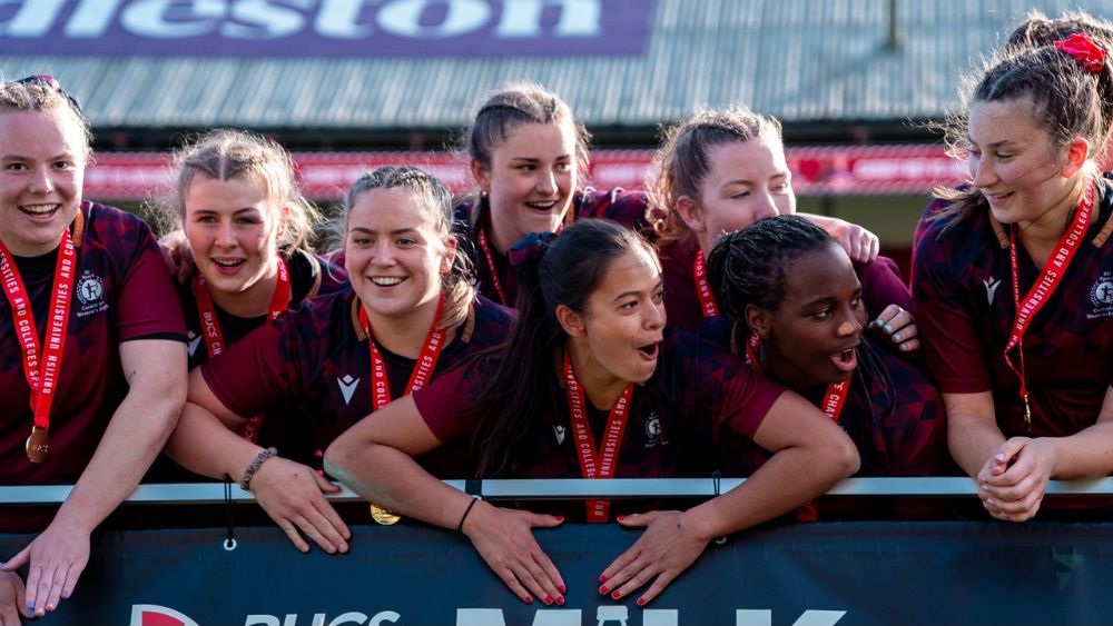 A group of female rugby players.